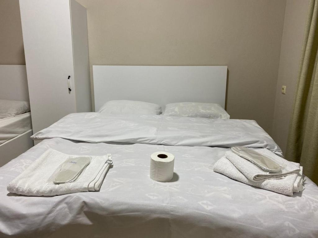 Postel nebo postele na pokoji v ubytování nira hotel