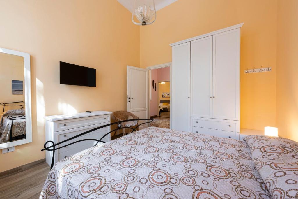 Łóżko lub łóżka w pokoju w obiekcie Villa Perondi by Mmega