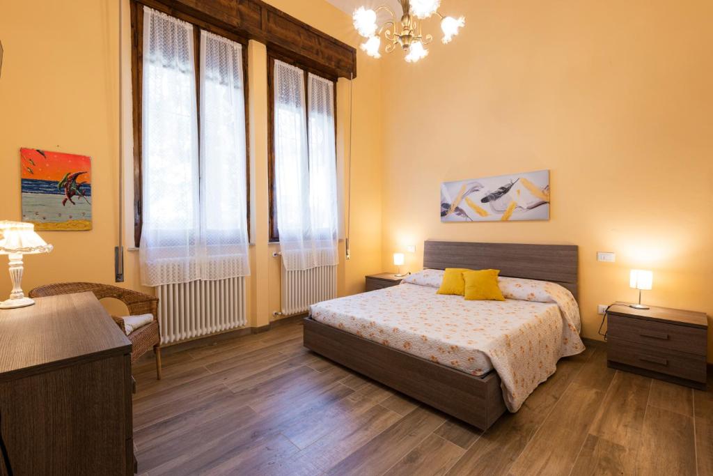 Łóżko lub łóżka w pokoju w obiekcie Villa Perondi by Mmega