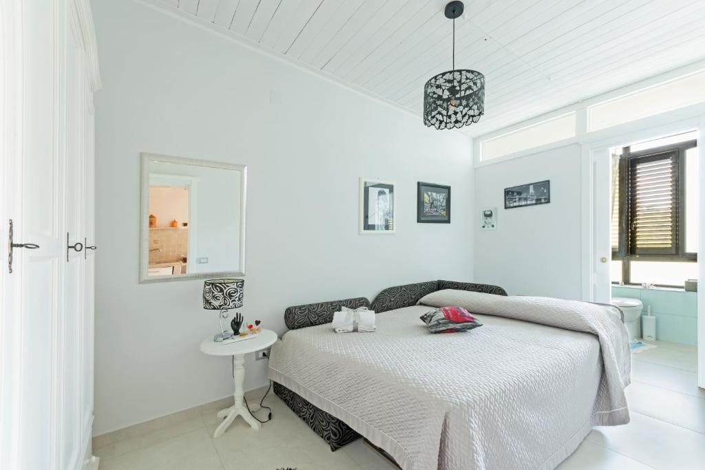 Posteľ alebo postele v izbe v ubytovaní Le Pendici Casa Vacanze