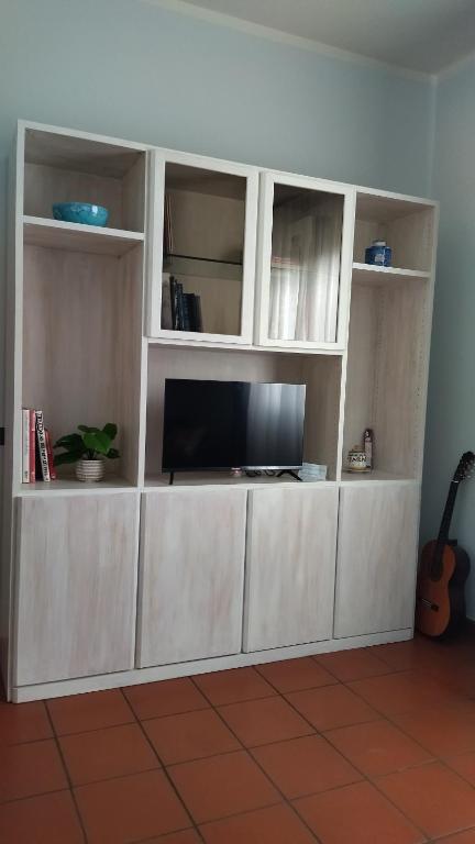 TV a/nebo společenská místnost v ubytování Il Gelsomino