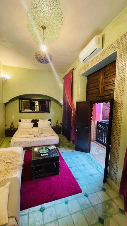 Postel nebo postele na pokoji v ubytování Riad Rêves D'orient & Spa
