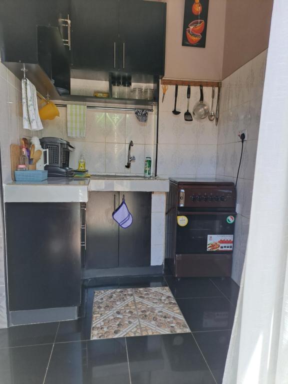 Kuchyň nebo kuchyňský kout v ubytování Kwinet Luxury Villa