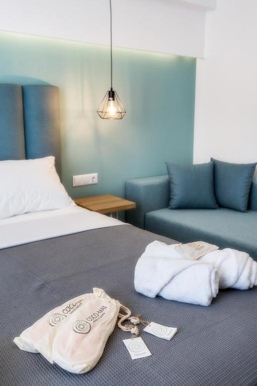 Postel nebo postele na pokoji v ubytování New Azzurro Deluxe