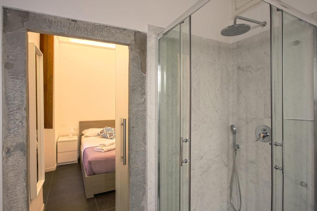 Łóżko lub łóżka w pokoju w obiekcie Classy apartment in Mercato Centrale Firenze