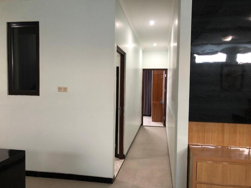 Fotografie z fotogalerie ubytování Bening Asri Guesthouse v destinaci Gombolpaya