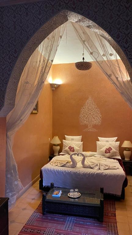 Postel nebo postele na pokoji v ubytování Riad Rêves D'orient & Spa