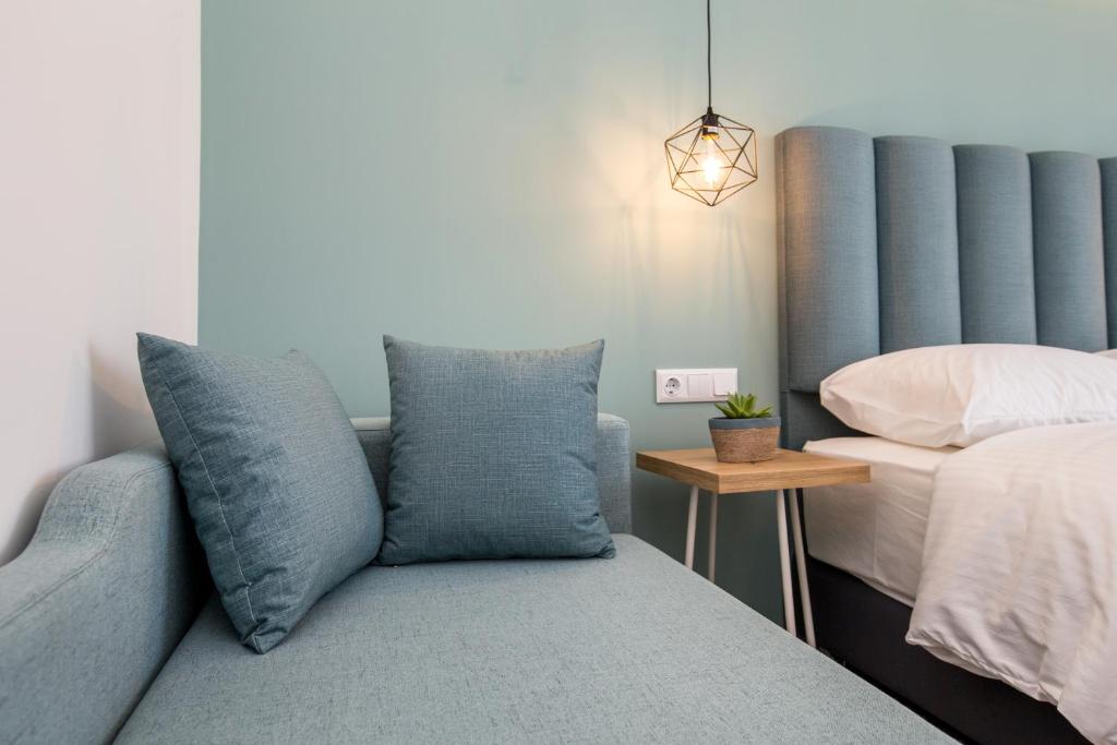 Postel nebo postele na pokoji v ubytování New Azzurro Deluxe