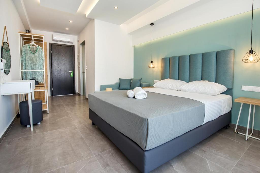 Postel nebo postele na pokoji v ubytování New Azzurro Deluxe