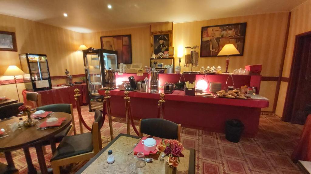 Nápoje v ubytování Hôtel 1er Consul Rouen
