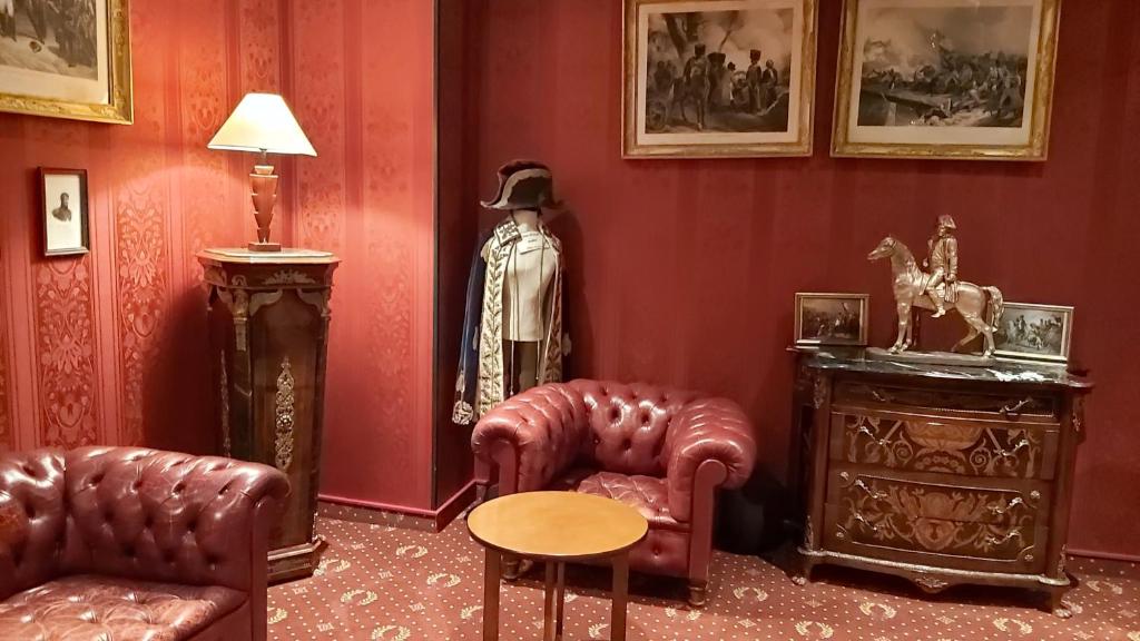 Posezení v ubytování Hôtel 1er Consul Rouen