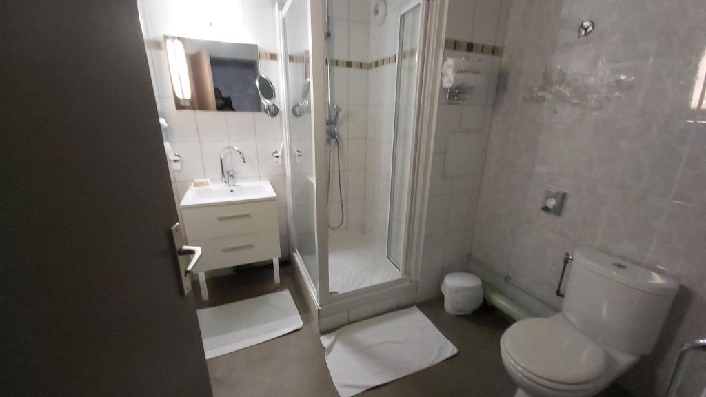 Koupelna v ubytování Hôtel 1er Consul Rouen