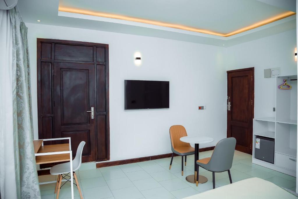 TV a/nebo společenská místnost v ubytování Hotel Amaranth