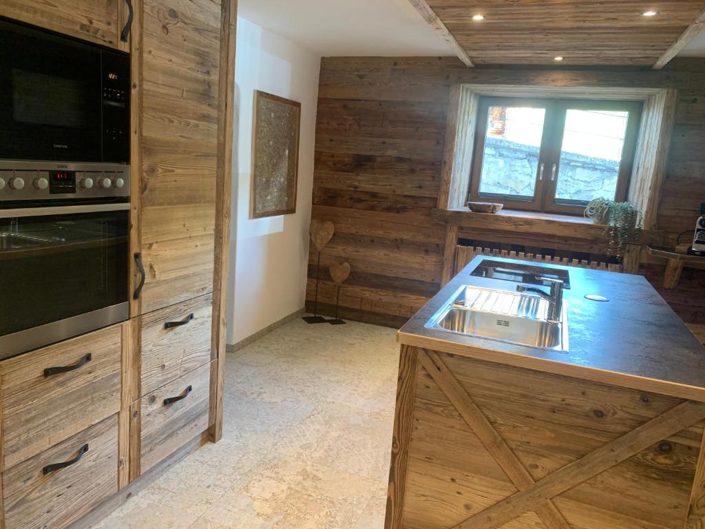 Kuchyň nebo kuchyňský kout v ubytování Chalet Paula