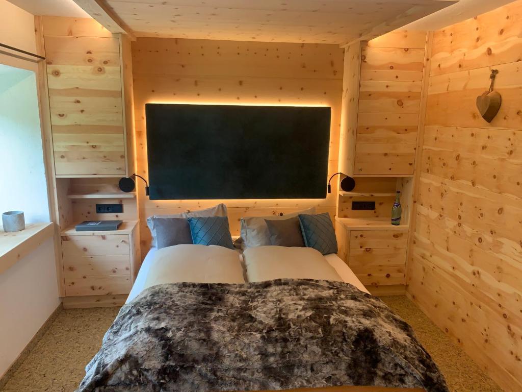 Postel nebo postele na pokoji v ubytování Chalet Paula