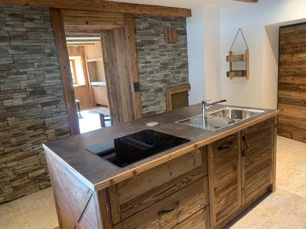 Kuchyň nebo kuchyňský kout v ubytování Chalet Paula