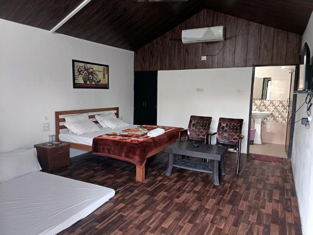 Postel nebo postele na pokoji v ubytování WILD RIDGE SARISKA RESORT