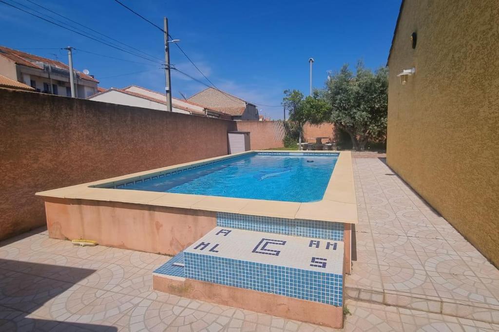 Bazén v ubytovaní Villa Chantal proche centre ville / Piscine / Clim / Parking alebo v jeho blízkosti