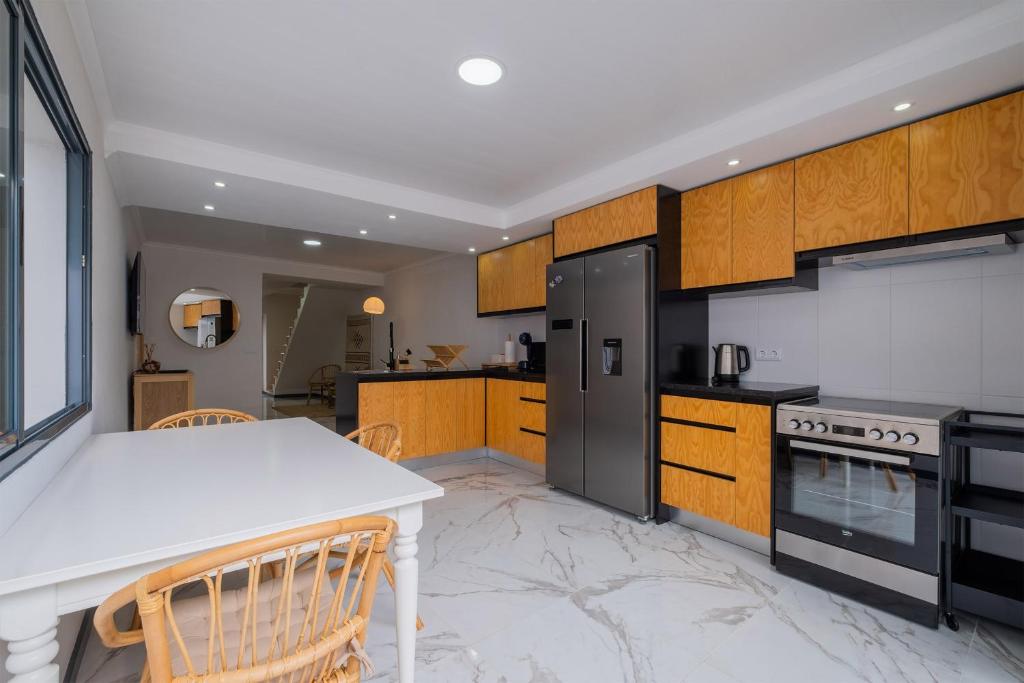 Kuchyň nebo kuchyňský kout v ubytování Casa da Antonieta