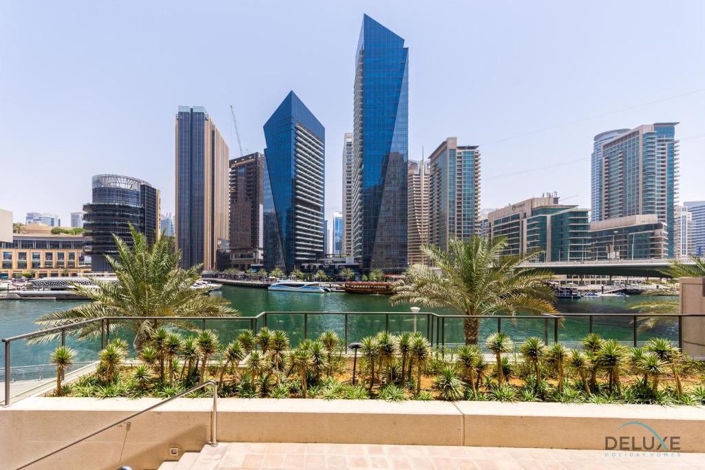 a view of a city with a river and buildings at Ideal 1BR at Marina Quay West Dubai Marina by Deluxe Holiday Homes in Dubai
