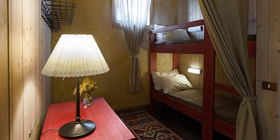 Postel nebo postele na pokoji v ubytování L'Isola Di Rosa - Relais & Hotel di Charme