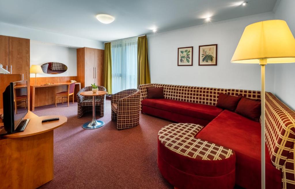 TV a/nebo společenská místnost v ubytování Hunguest Hotel Pelion