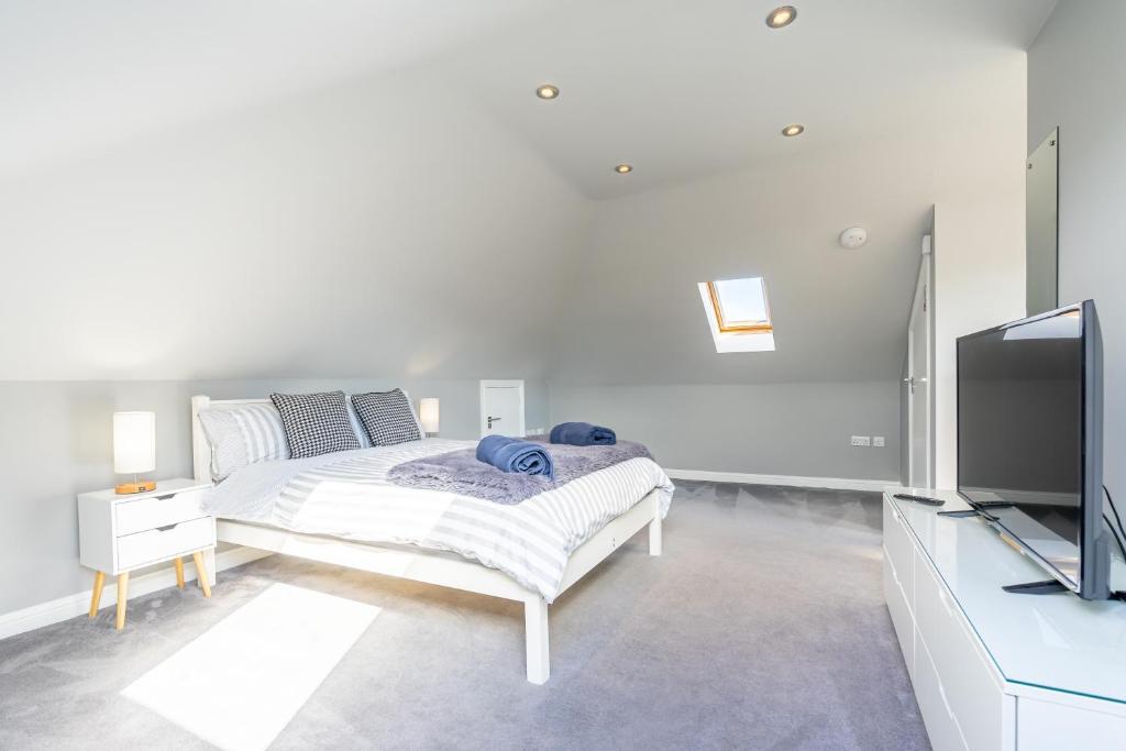 Een bed of bedden in een kamer bij Craigey Beach Home