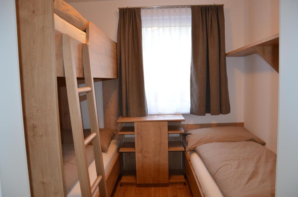Postel nebo postele na pokoji v ubytování Apartment Haus Van der Leij