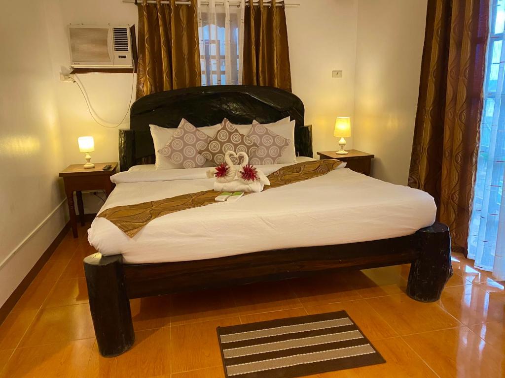 Postel nebo postele na pokoji v ubytování Sophias Beach Guest House