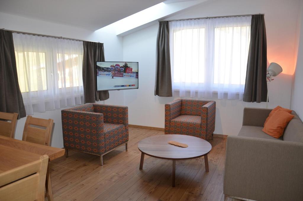 TV a/nebo společenská místnost v ubytování Apartment Haus Van der Leij