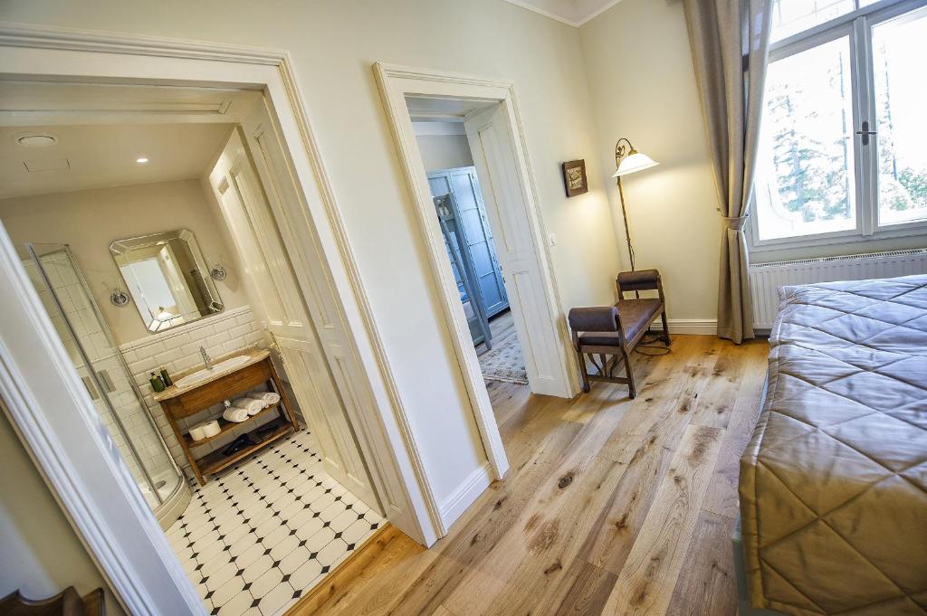 Postel nebo postele na pokoji v ubytování Vila Lavina