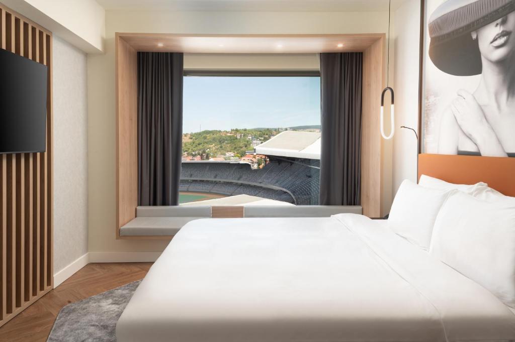 Postel nebo postele na pokoji v ubytování Radisson Blu Hotel, Cluj
