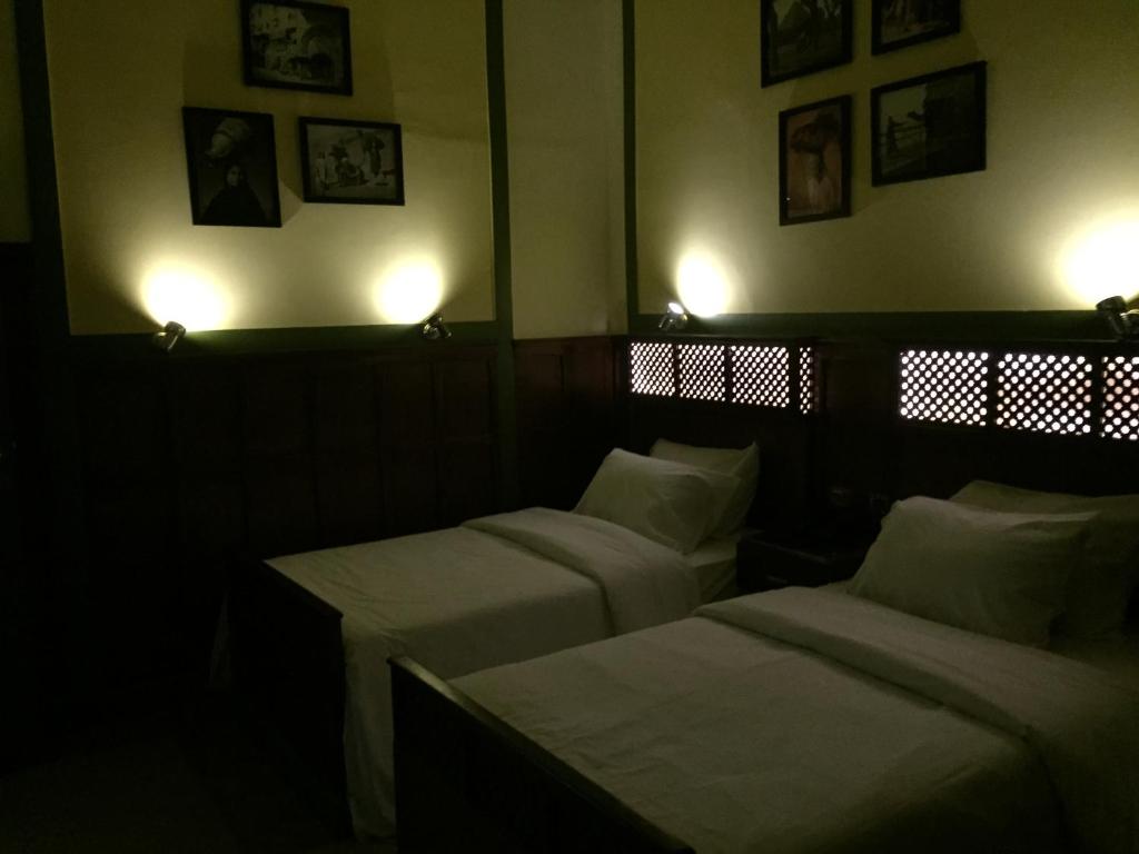 Postel nebo postele na pokoji v ubytování Carlton Downtown Cairo