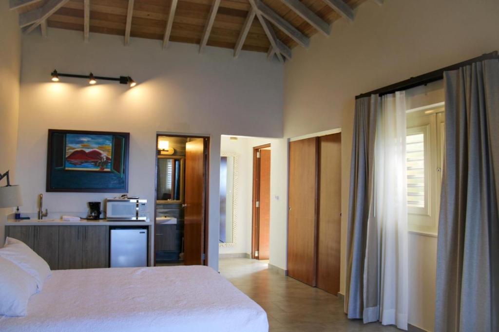 Cama o camas de una habitación en Aleli Cottages