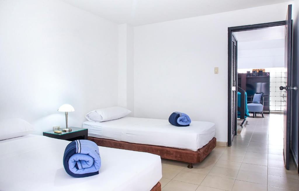 Voodi või voodid majutusasutuse Santorini Villas Santa Marta toas