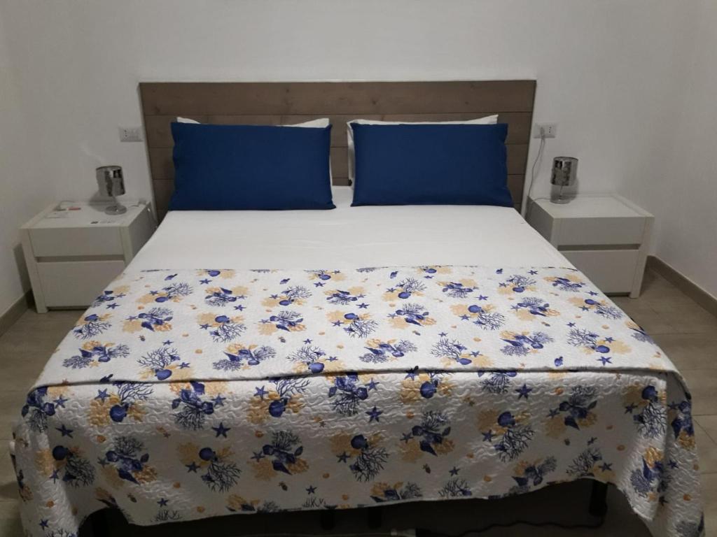 Posteľ alebo postele v izbe v ubytovaní un passo dal mare