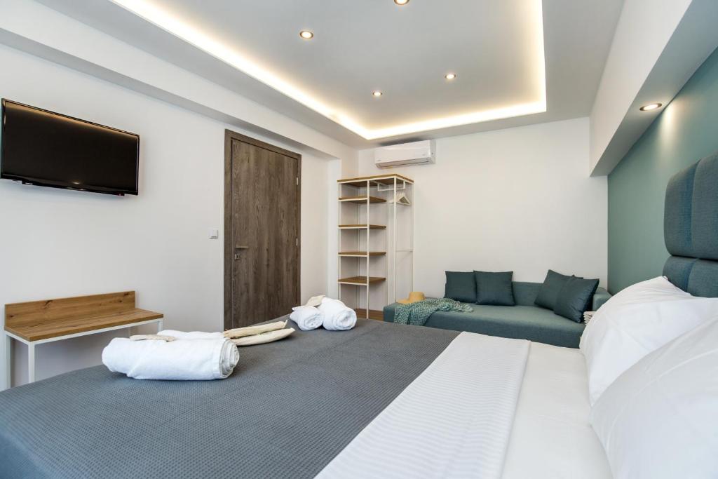 Postel nebo postele na pokoji v ubytování New Azzurro Deluxe