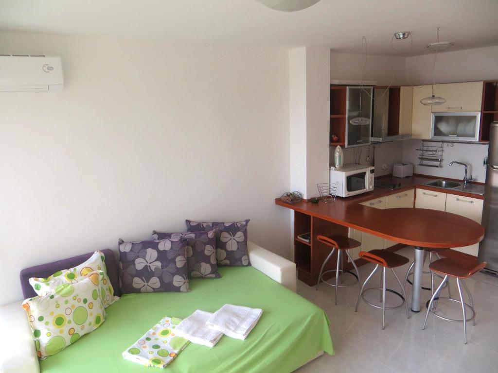 A kitchen or kitchenette at Holiday Apartment in Riviera Complex