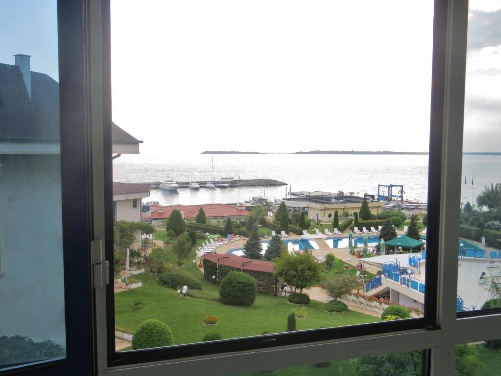 The swimming pool at or close to Holiday Apartment in Riviera Complex