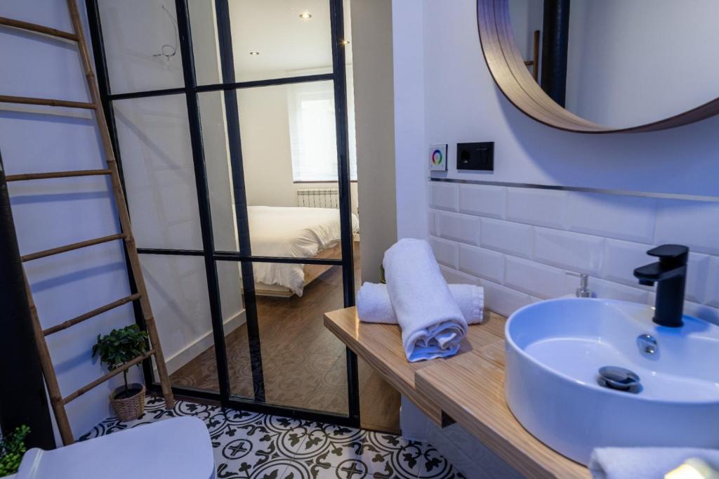 Łóżko lub łóżka w pokoju w obiekcie Fantastic brand new apartment in best location just few steps from the ski slope! private parking