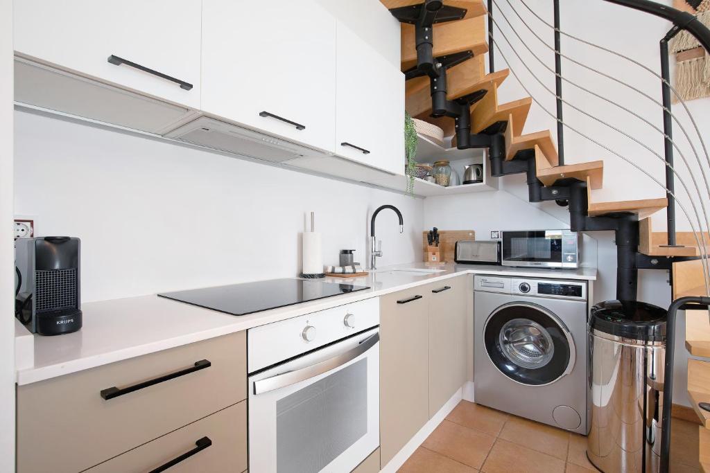 Kuchyňa alebo kuchynka v ubytovaní Villa Escapada