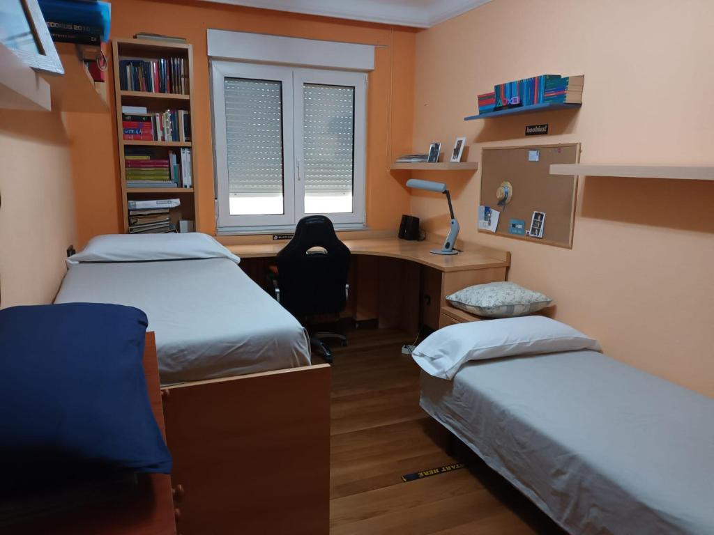 Postel nebo postele na pokoji v ubytování IDEAL FAMILAS
