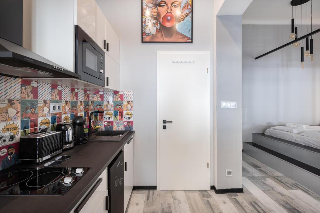 Kuchyňa alebo kuchynka v ubytovaní S15- Boutique Apartments, Best Location, by BQA