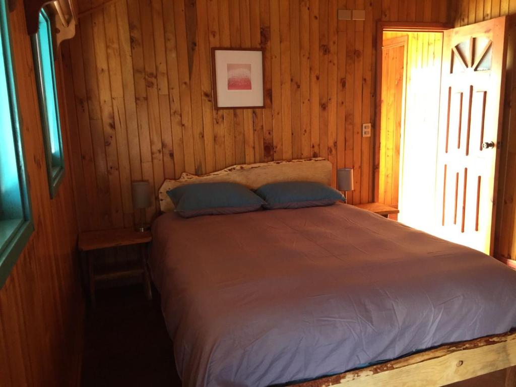Uma cama ou camas num quarto em Hostel Raíz