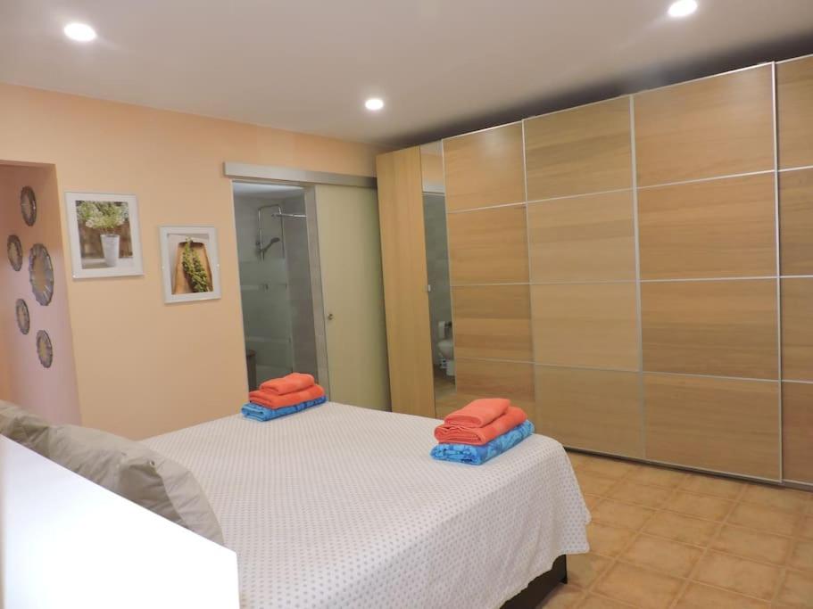 Postel nebo postele na pokoji v ubytování Villa Ventura - Piscina climatizada & Aire acondicionado