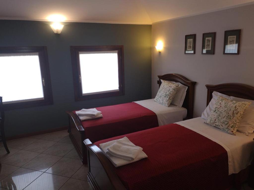 Posteľ alebo postele v izbe v ubytovaní Hotel Ristorante Regina