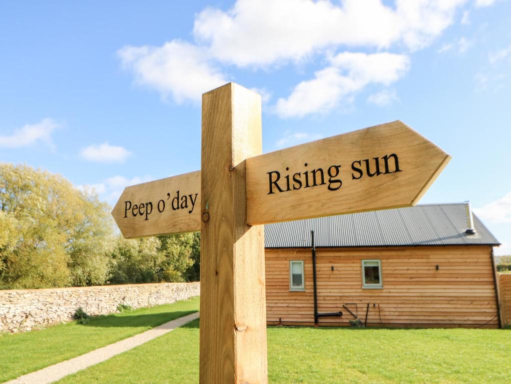 Certifikát, hodnocení, plakát nebo jiný dokument vystavený v ubytování Rising Sun