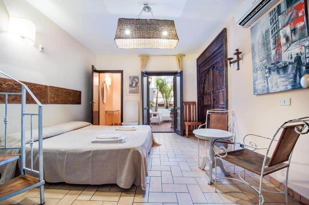 Postel nebo postele na pokoji v ubytování Porta di Castro Boutique Hotel & Pool