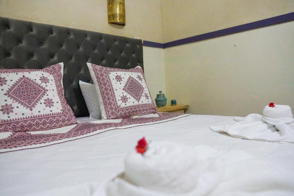 Postel nebo postele na pokoji v ubytování Winarouze house