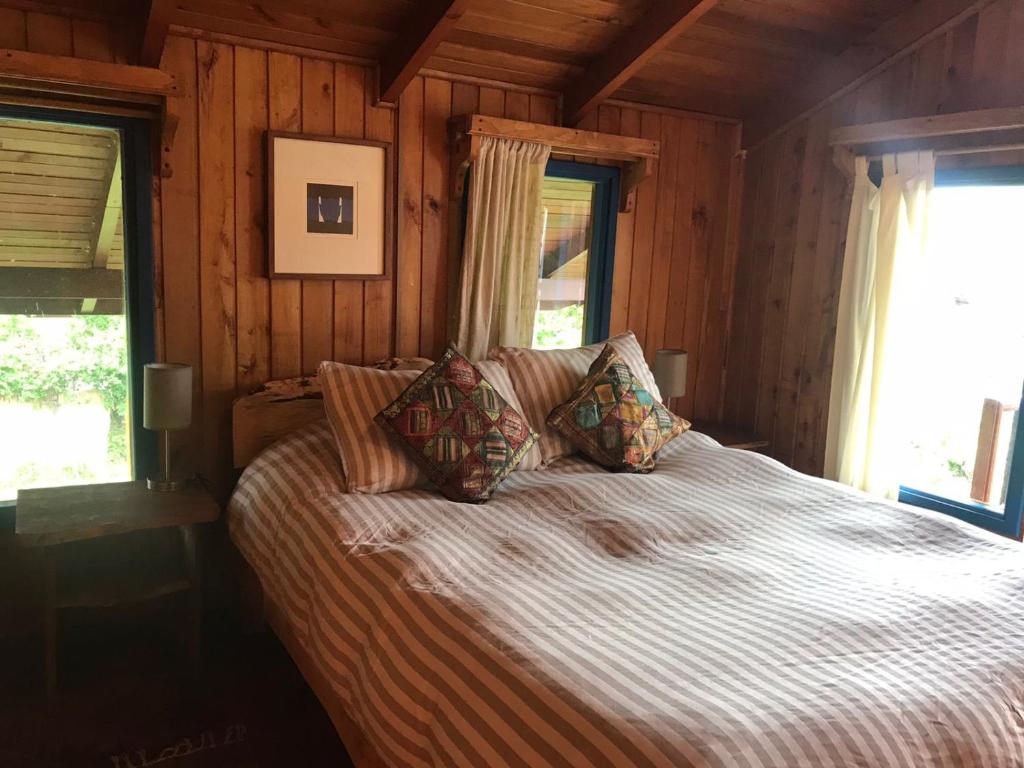 Uma cama ou camas num quarto em Hostel Raíz